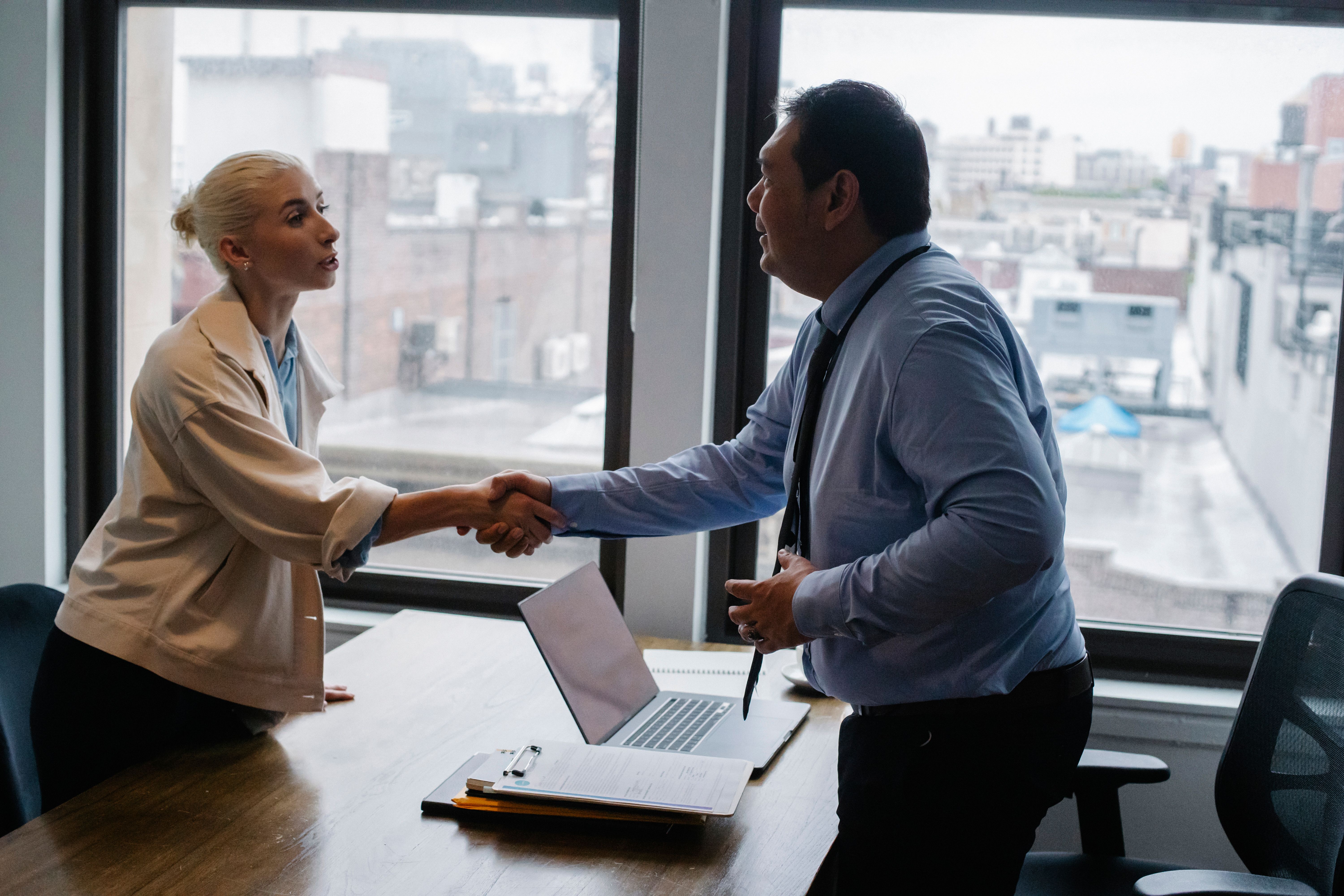 A learner meeting an employer in a modern workspace